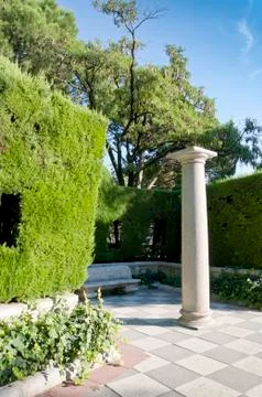 Column and garden Stock Photos