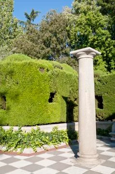 Column and garden Stock Photos