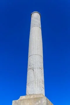 Column on blue sky background Stock Photos