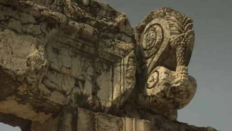 Column Capital Remnants from Ancient Synagogue, Capernaum, Israel Stock Footage 321654525