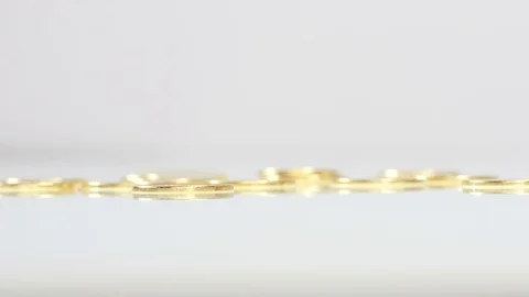 Column of coins falls down Stockbeeldmateriaal 70377288