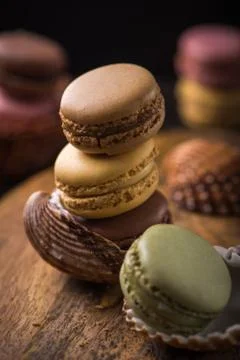 Column with cracked macaroons in sea shells Stock Photos