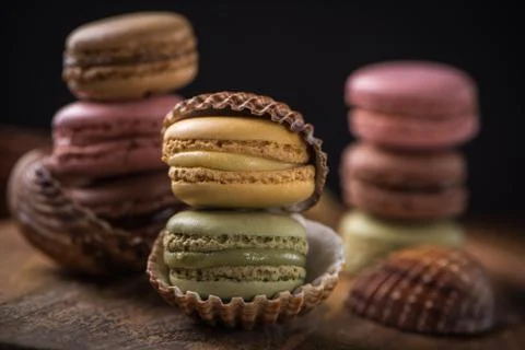 Column with cracked macaroons in sea shells Stock Photos