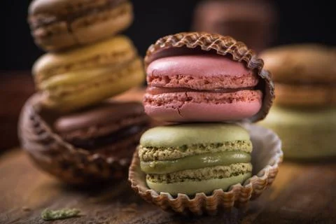 Column with cracked macaroons in sea shells Stock Photos
