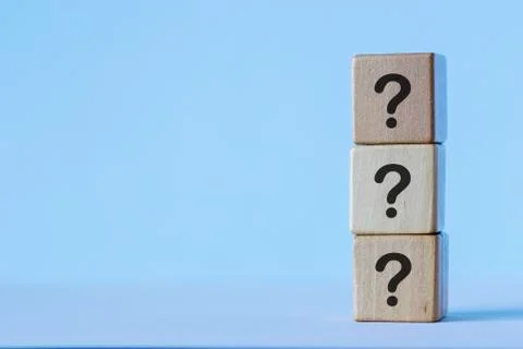 Column of dices with questions Stock Photos