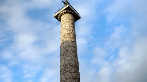 Column of Emperor Marcus Aurelius with a statue of the Apostle Paul on top Stock Footage 153678913