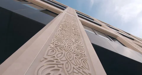 The column of a modern beautiful building is decorated with interesting carvings Stock Footage 119556629