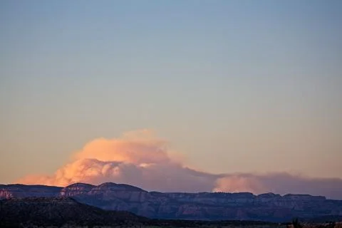 Column of smoke rising from the distant Schultz Fire, Flagstaff, Arizona. Stock Photos