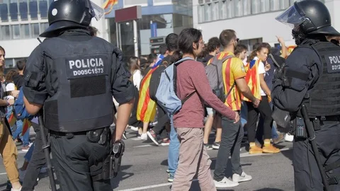 Column of Young People marching in front the Police During the protests claim Stock Footage 118123421