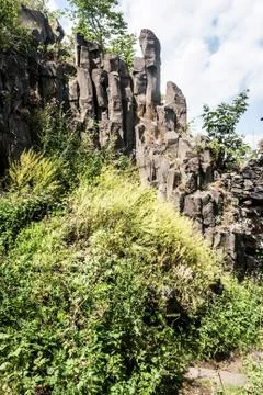 Columnar basalt on Ostry hill in Ceske stredohori mountains Stock Photos
