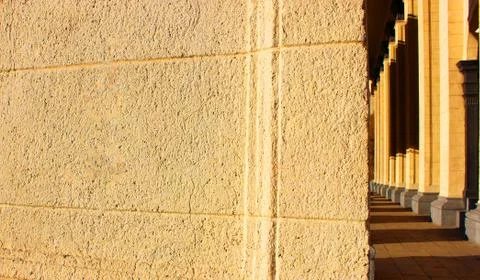 Columnar building Details of beige marble columns on the building. Embossed Stock Photos