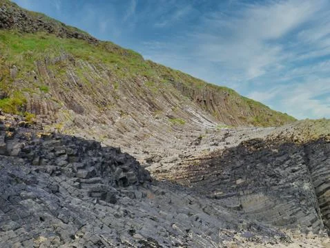 Columnar jointed volcanic basalt rocks on the island of Staffa, UK Stock Photos