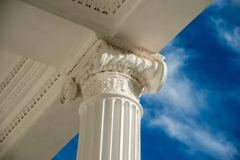 Columns on blue sky background. Stock Photos