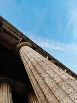 Columns on blue sky background Stock Photos