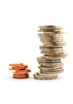 Columns of   coins isolated on white Stock Photos
