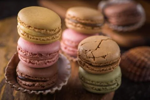 Columns with cracked macaroons in sea shells Stock Photos