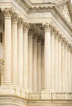Columns marble repetition perspective. Columns fluted symmetry architectura.. Stock Photos
