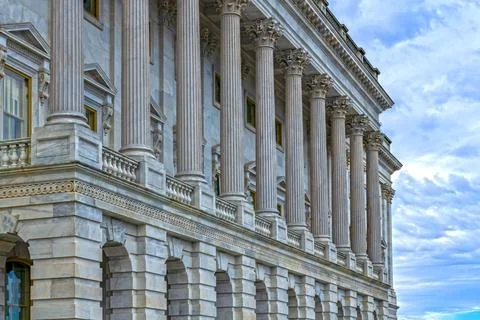 Columns marble Tall vertical perspective. Columns fluted symmetry pattern. Co Stock Photos