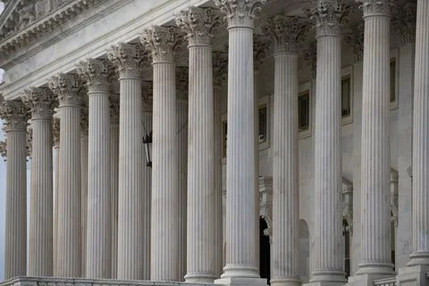 Columns marble Tall vertical repetition. Columns architectural symmetry pat.. Stock Photos