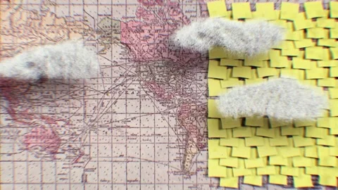 Columns of pink, blue and yellow sticky notes over an old map Stock Footage 346778236