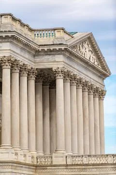 Columns Tall vertical texture background. Columns marble repetition symmetr.. Stock Photos
