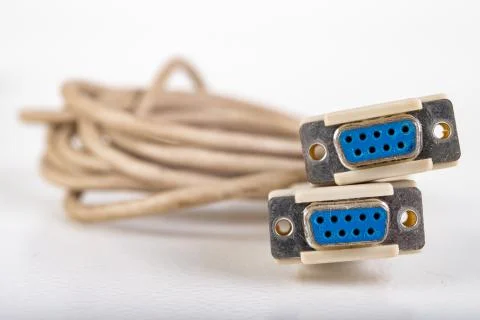 Com-com cable used to connect PCs. Old computer accessories. Stock Photos