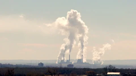 Comanche Generating Station Pueblo Colorado Steam with traffic telephoto Stock Footage 59079198