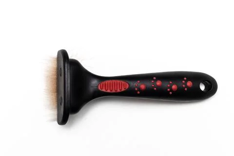 Comb for combing wool from animals on a white background Stock Photos