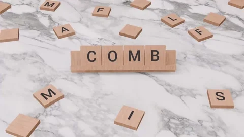 Comb word written on scrabble Stock Footage 256393172