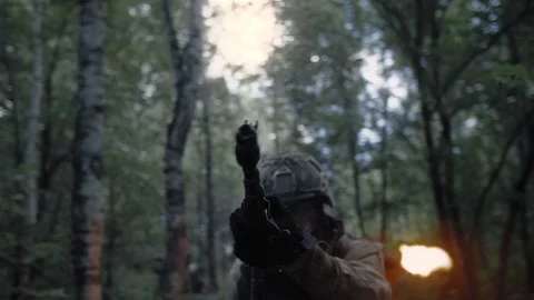 Combat action. An armed special forces soldier in a hot spot Stock Footage 327357585