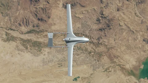 Combat aerial drone flying at high altitude. Stock Footage 333315847