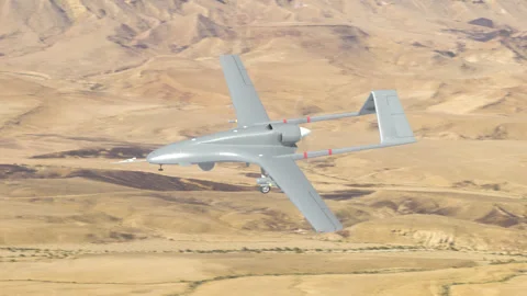 Combat aerial drone flying at high altitude. Video stock 336618884