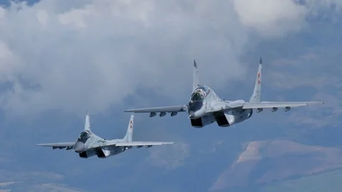 Combat Aircrafts of Cold War in Flight. MiG29 Air to Air Ultra High Definition Stock Footage 71174117