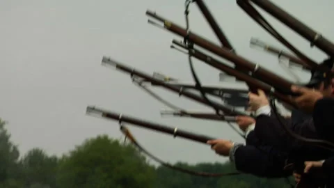 Combat Camera embedded with a Union Firing line - Civil War Battle reenactment Stock Footage 195514326
