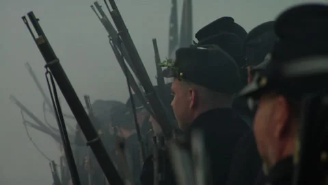 Combat Camera embedded with a Union Firing line - Civil War Battle reenactment Stock Footage 195514766