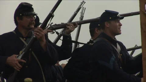 "Combat Camera" with a Union Firing line - Civil War Battle reenactment Stock Footage 184653583