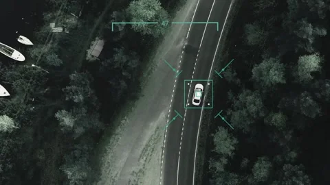 A combat drone has taken aim at the car and is watching it from above. Stock Footage 145149197