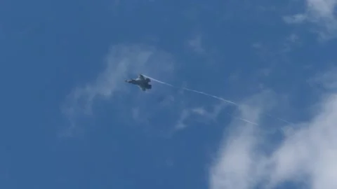 Combat Fighter Jet Maneuvering Across the Sky Video stock 345092249