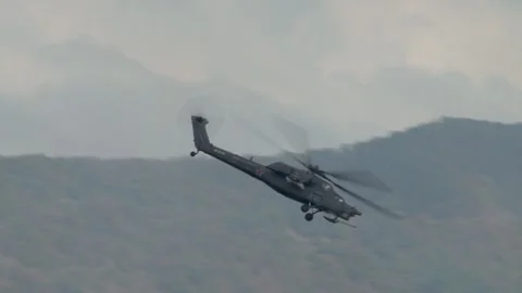 Combat helicopter Mi-28N, night hunter (NATO Havoc) flies over of Gelendzhik Bay Stock Footage 132106816