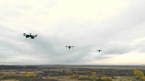 Combat military drones fly on the sky background. Stock Footage 229110540