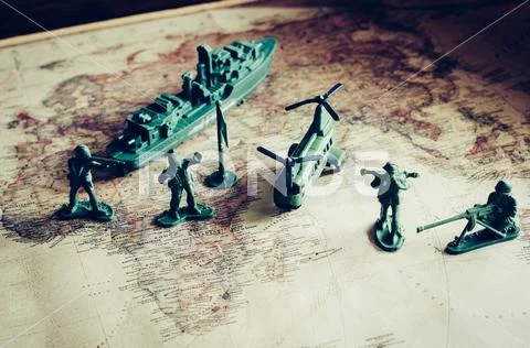 Combat, military use, and tactics in action on a world map. Stock Photos