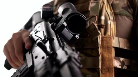 Combat rifle with tactical armor in the hands of a special forces soldier. Stock Footage 158017415
