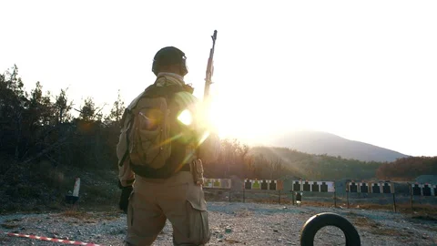 A combat specialist from the detachment fires at a training ground Stock Footage 128126576