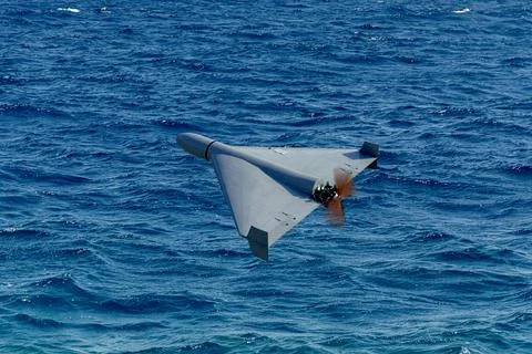 Combat surface drone flying over the sea , war in Ukraine, drone attack,  Stock Photos