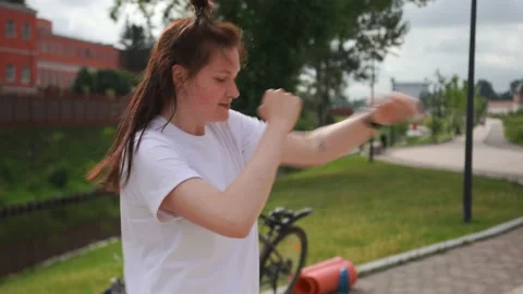 Combat trainer in street training shows, tells trainees about practiced strikes Stock Footage 156905180