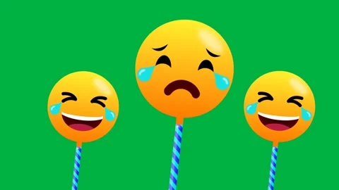 Combination of crying and laughing emoji in swinging motion isolated on gre.. Stockbeeldmateriaal 270451254