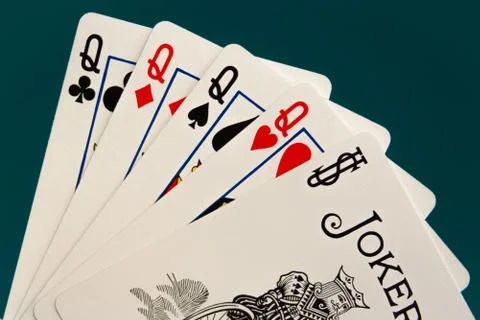 Combination of five different play cards with jocker Stock Photos