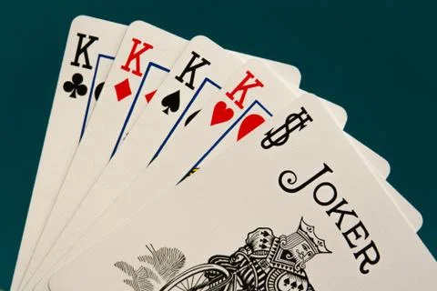 Combination of five different play cards with jocker Stock Photos