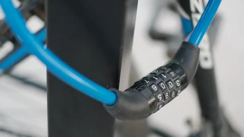 Combination lock on a bike left in the parking lot, close-up Stock Footage 244459234