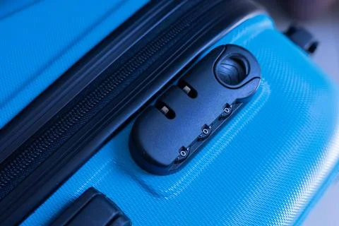 Combination lock on blue suitcase Stock Photos